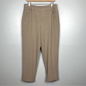 Chico’s tan poly rayon spandex elastic waist pullon pants, size large.